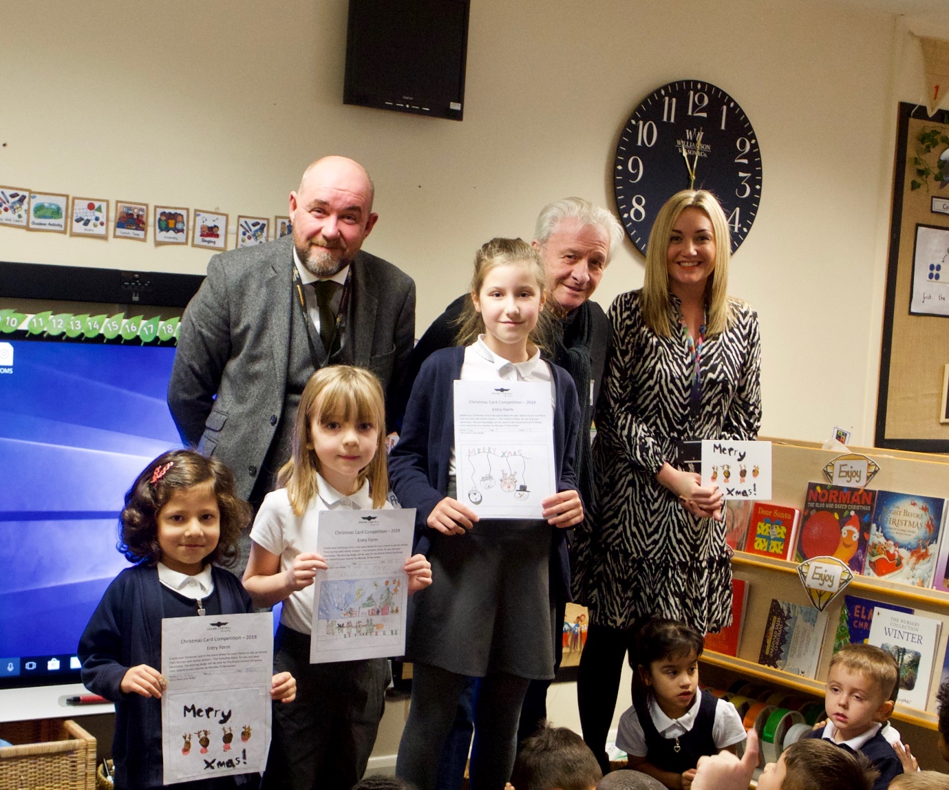 Ashley Jackson, Sean English and winners with the winning artwork