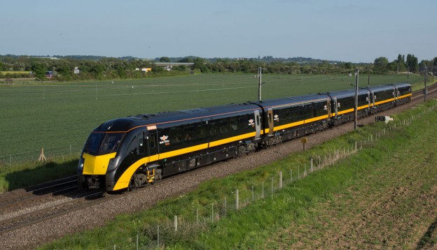 Grand Central Train driving through English countryside