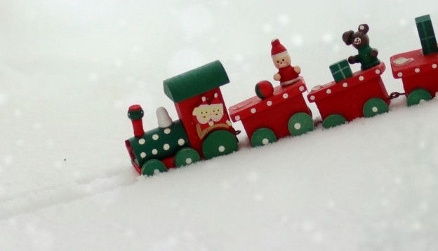 A toy Christmas train in the snow