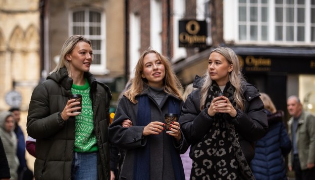 Three women walking in York